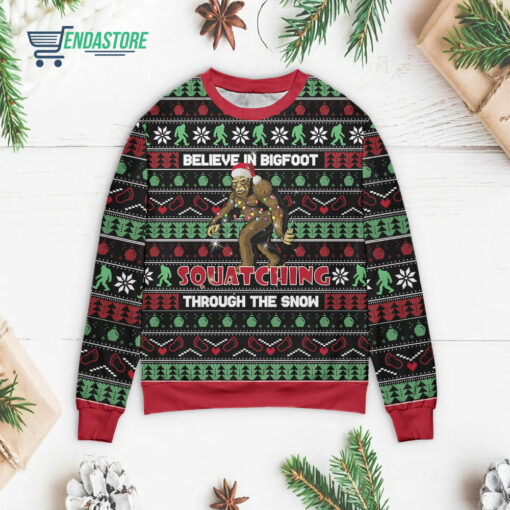 Front 72 26 Believe in bigfoot squatching through the snow Christmas sweater