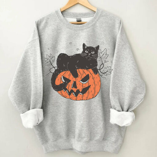 70094f7b6022435bbcc7ee86ecfcbd28 Black Cat on Pumpkin sweatshirt